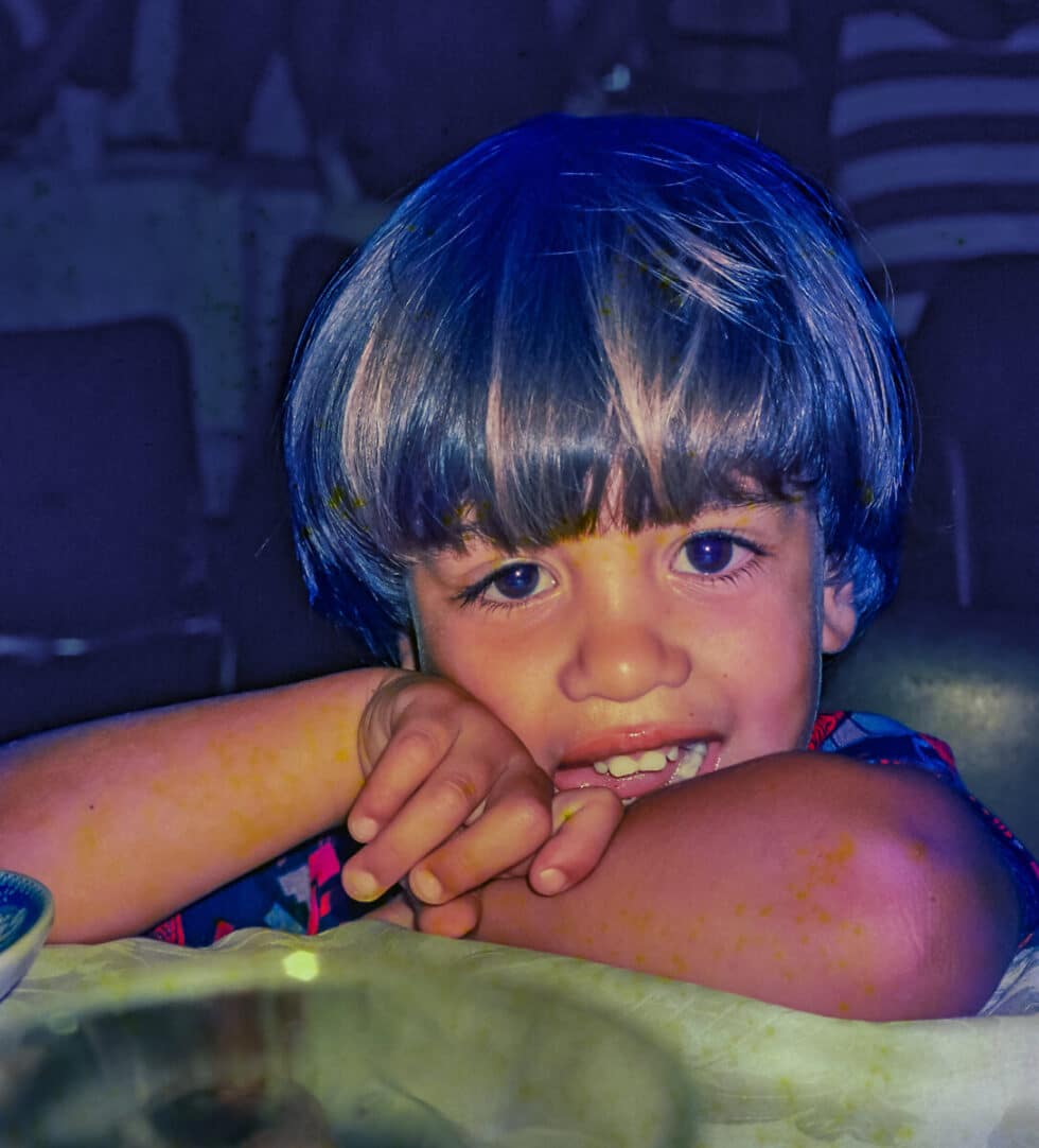 Marita and Juan Carlos' son, Bernardo, with his big brown eyes and bowl cut hair, leaning on his folded arms. A Peace Corps volunteer’s story in Baltasar Brum, Uruguay.