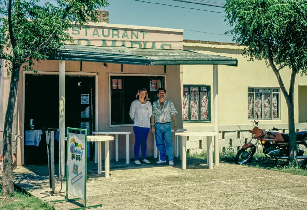 Maria and Ruben standing in front of their restaurant, Dos Marias.