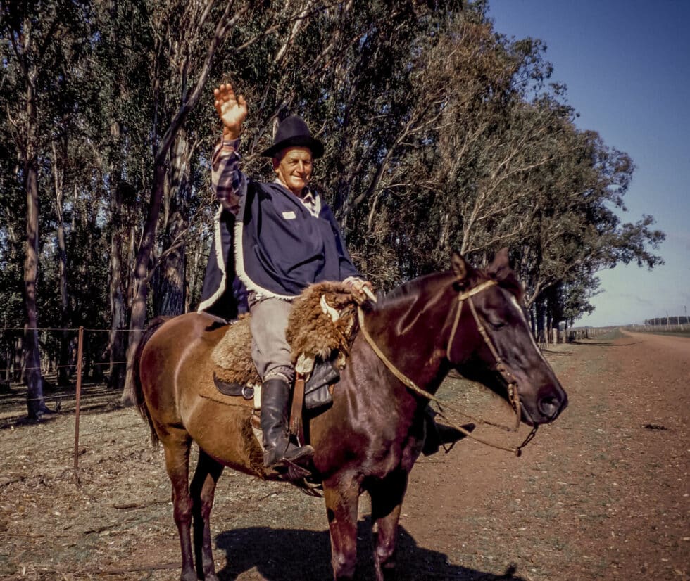 Gaucho on horseback waving. A Peace Corps volunteer’s story in Baltasar Brum, Uruguay.