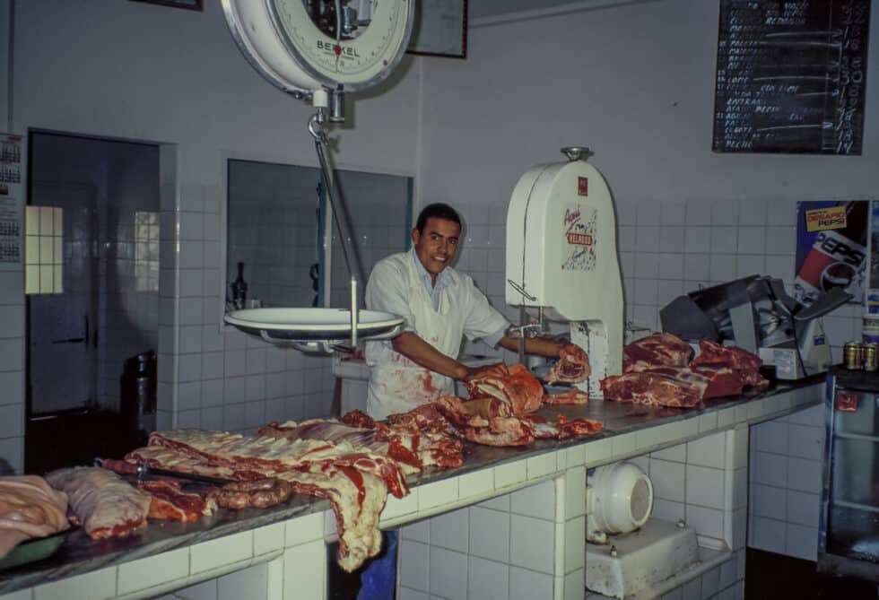Butcher in meat market. A Peace Corps volunteer’s story in Baltasar Brum, Uruguay.