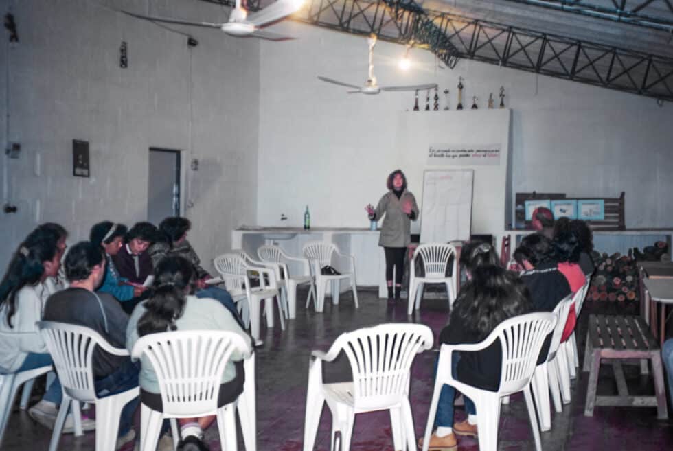 Standing in front of a classroom teaching basic business skills. A Peace Corps volunteer’s story in Baltasar Brum, Uruguay.